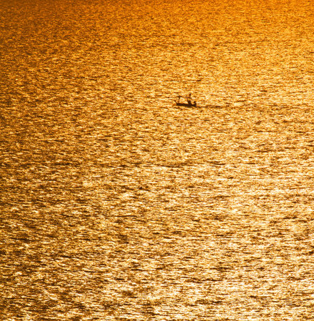 Background of reflection of sunlight on the seaの写真素材