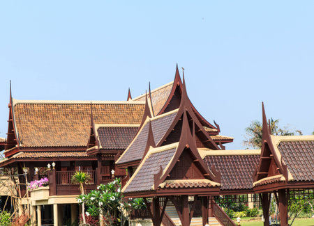 Roof of Thai style home on day timeの写真素材