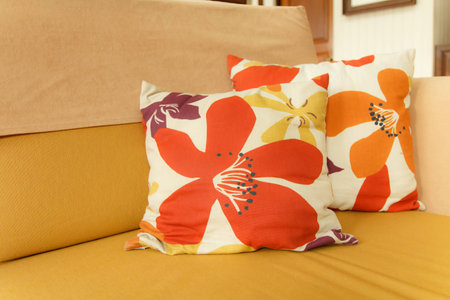 Beautiful handmade pillows on sofaの写真素材