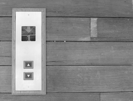 Elevator button with down directionの写真素材