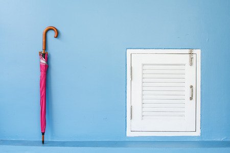 Front view of a storage room and umbrellaの写真素材