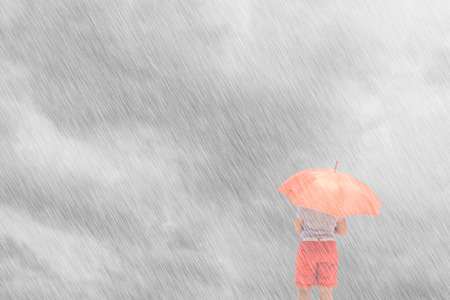Woman with umbrella and sky backgroundの写真素材
