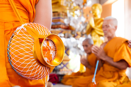 New monk with yellow bowlの写真素材