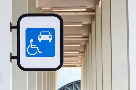 disability and taxi sign at the airportの写真素材