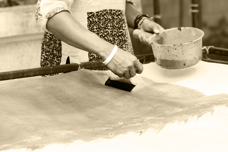 hand painting picture with paintbrushの写真素材