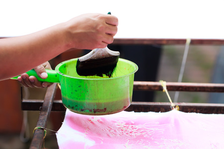 hand painting picture with paintbrushの写真素材
