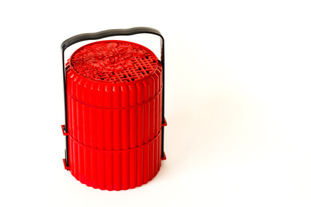 Red food carrier isolated on white backgroundの写真素材