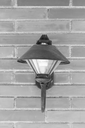 Wall lamp on brick backgroundの写真素材