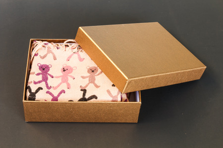 Brown paper box isolated on black backgroundの写真素材