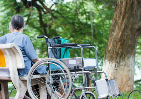 Senior woman in a wheelchair at the parkのeditorial素材