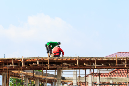 Construction worker working on construction siteの写真素材