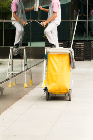 Mop bucket with cleaner backgroundの写真素材