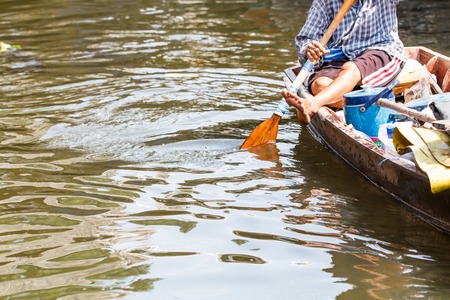 Close-up people with small boat at the float market-2の写真素材