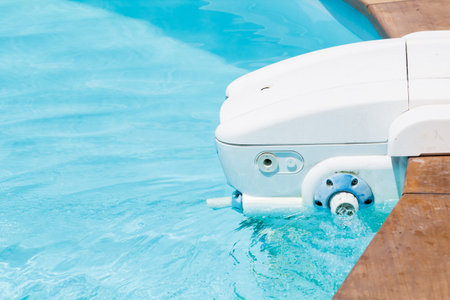 Water pump cleaning water in poolの写真素材