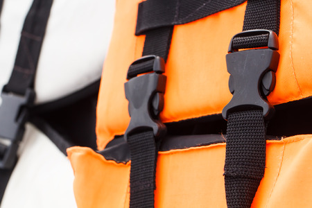 Close-up of orange life vest jacket-2の写真素材