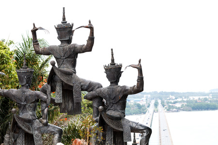 Statue of Nora with Tinsulanonda bridge view at Songkhla provinceの写真素材