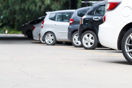View of white car park in parking lot