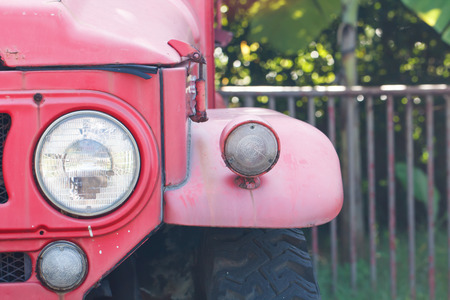 Front light of red old carの写真素材