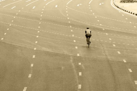 Top view perspective of people ride bicycle in sepiaの写真素材