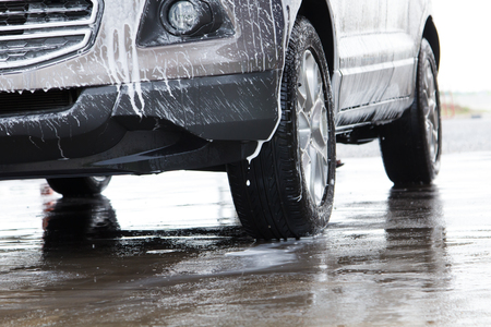 car washing in local car wash shop serviceの写真素材