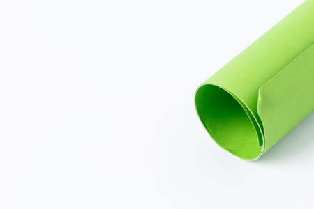 Rolls of green color paper on white background