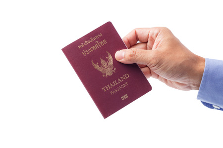 Hand with Thailand passport isolated on whiteの写真素材