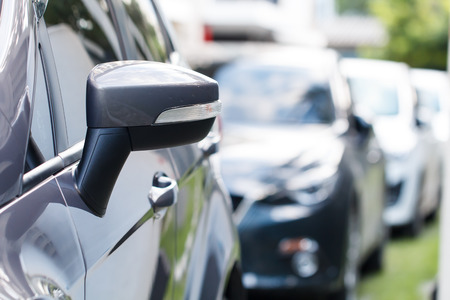 Car parking in line on daytimeの写真素材
