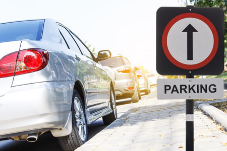 car parking in line outdoor on daytimeの写真素材