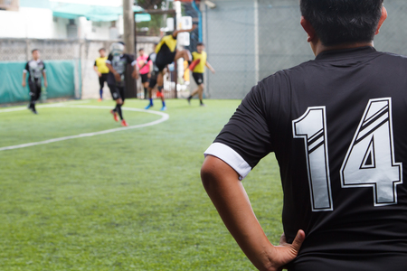 Soccer ball player looking match competition outside  fieldの写真素材