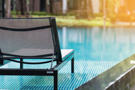 Beach chair in public swimming poolの写真素材