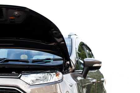 Car parked on the side of the road with white background. For assistance repair by a qualified car mechanic.の写真素材