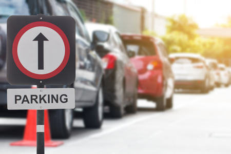 The parking lot label indicates the parking permit for the area, with a long blurred backgroundの写真素材