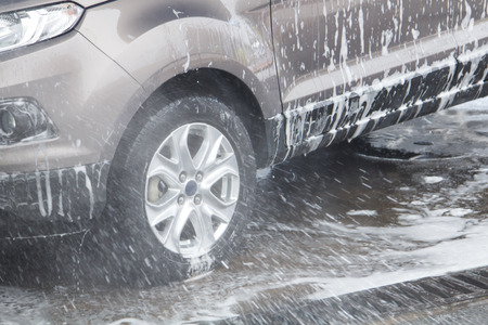 Car washing at the car wash shop to clean up dirt and keep the health of the driver and passengersの写真素材