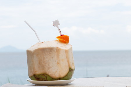 Fresh coconut water on beach prepare for drinkの写真素材