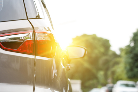 Car parked nearly inside an outdoor parking lot on daytimeの写真素材