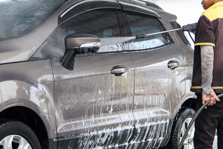 Car washing at the car wash shop to clean up dirt and keep the health of the driver and passengersの写真素材