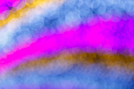 bokeh abstract background with purple yellow white and blue colorの写真素材
