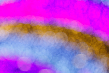 bokeh abstract background with purple yellow white and blue colorの写真素材
