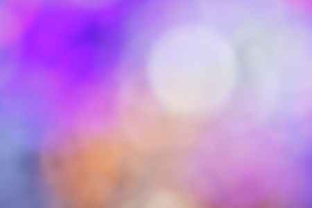 Blur bokeh abstract background with purple yellow white and blue colorの写真素材