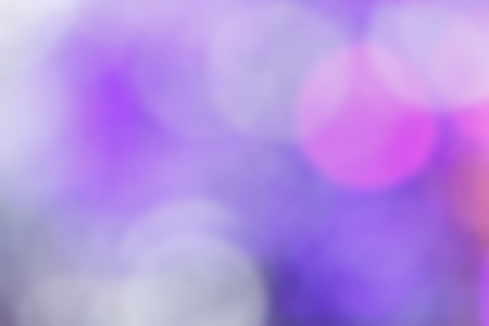 Blur bokeh abstract background with purple yellow white and blue colorの写真素材