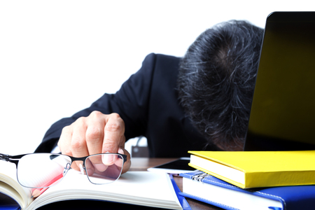 Businessman in stressful mood, the concept represents the busy work of the office and stress.の写真素材