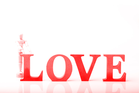 Wooden Doll with red Love Letter, Concept for Love with Valentine's Dayの写真素材