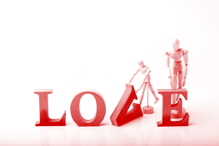 Wooden Dolls with Love Letter, Concept for Love with Valentine's Dayの写真素材
