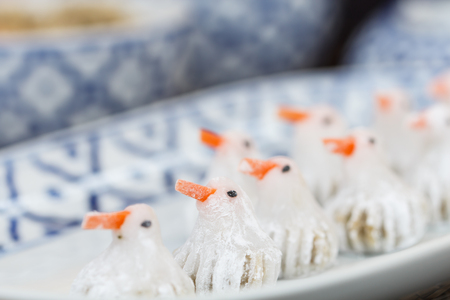 Steamed bird shape dumplings or Thai dumplings is Thai royal dessertの写真素材