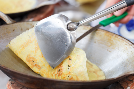 Thai crispy pancakes  on processの写真素材