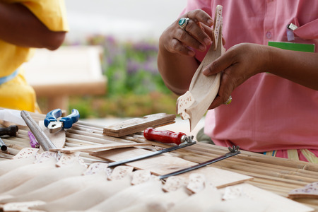 Traditional craftsman making wooden boatの写真素材