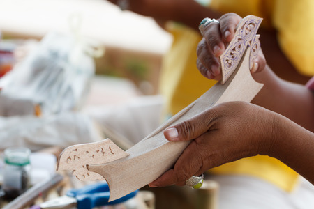 Traditional craftsman making wooden boatの写真素材