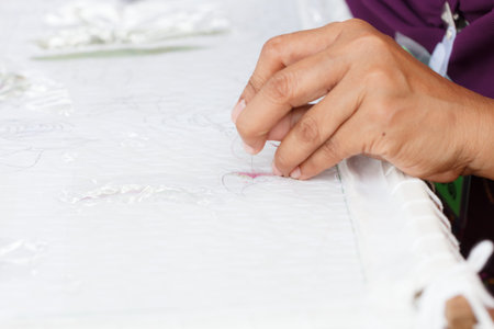 The hand craft of woman embroidered pictures with needle and thread.の写真素材