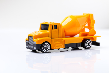 Construction car model on white backgroundの写真素材