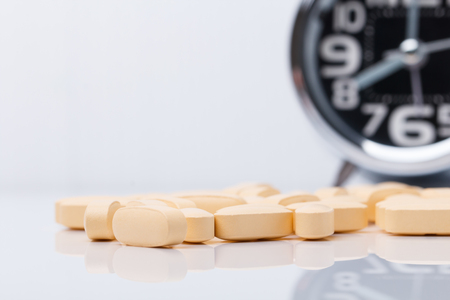 Concept of warning to take medicine on time.の写真素材